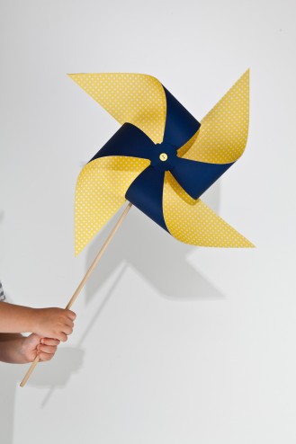 Large yellow and blue pinwheel on dowel Large yellow and navy blue pinwheel on dowel