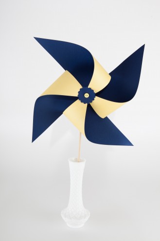 Navy blue and yellow pinwheel Large Navy blue and yellow pinwheel in vase
